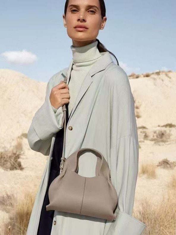 Cloud Dumpling Top-Handle Shoulder Bag in Black — back view