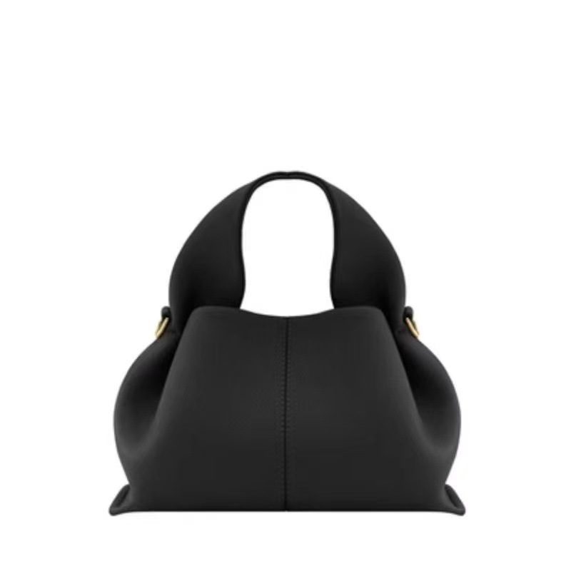 Cloud Dumpling Top-Handle Shoulder Bag in Black — styling photo