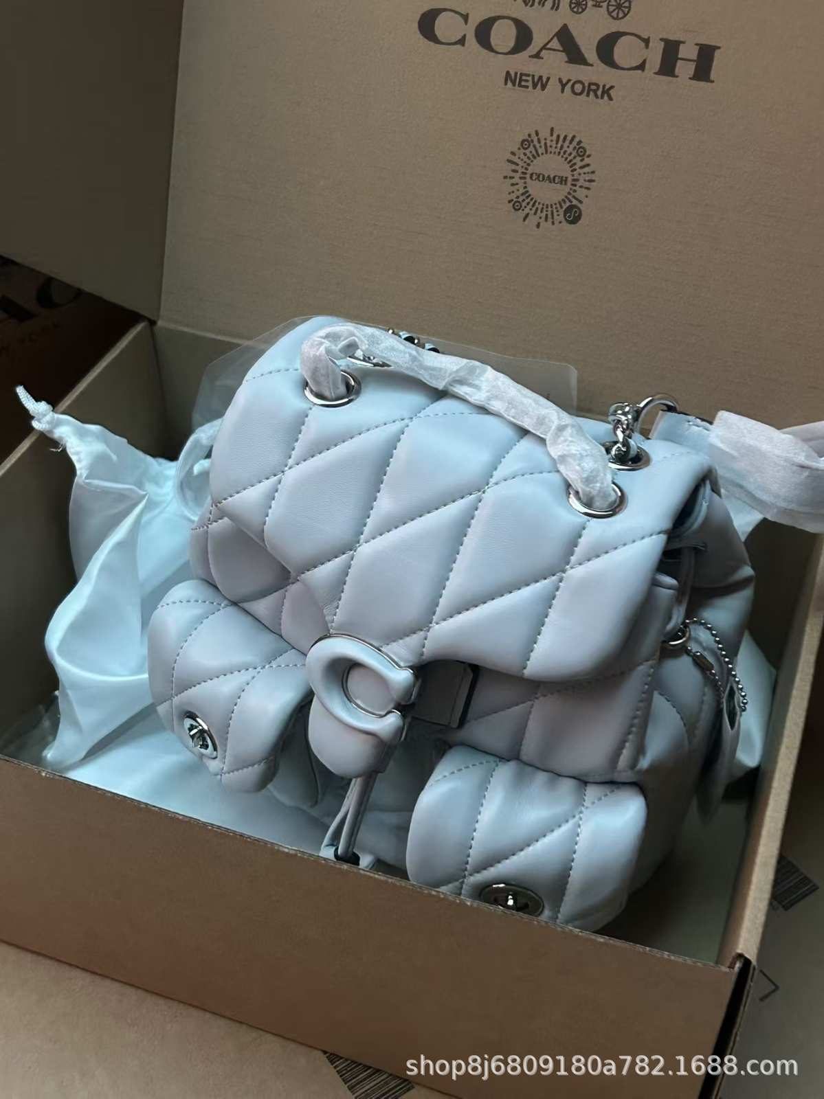 Cowhide Quilted Chain-Strap Shoulder Bag in Classic — worn on shoulder