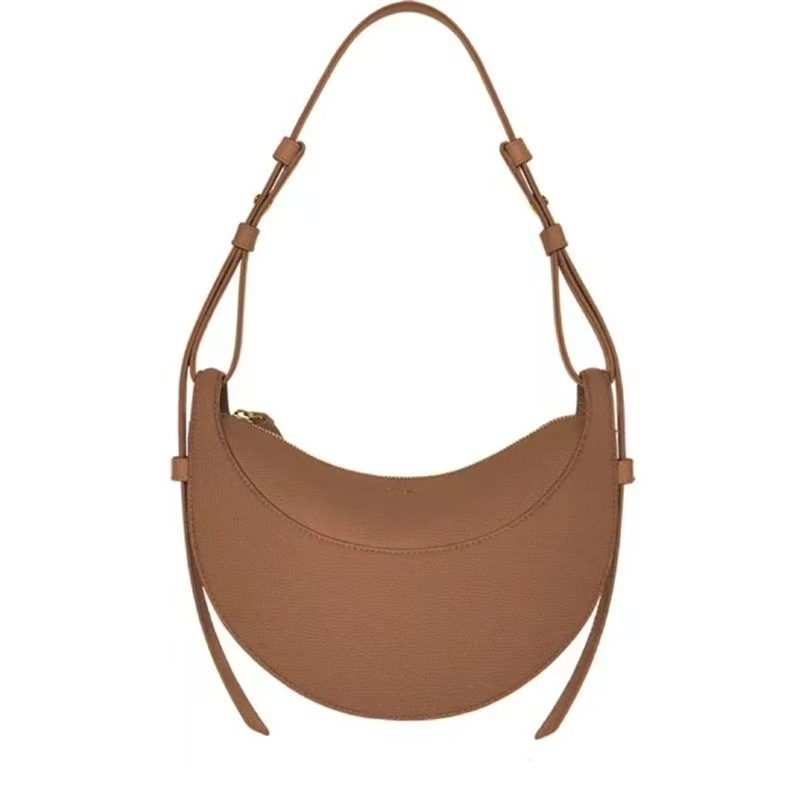 Crescent Saddle Shoulder Bag in Brown — styling photo