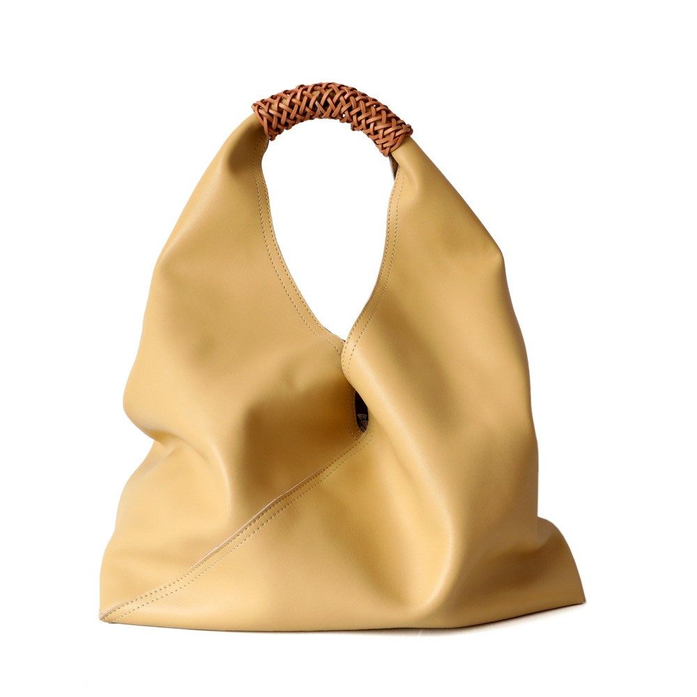 Hollow Woven Bag in Beige — detail close-up