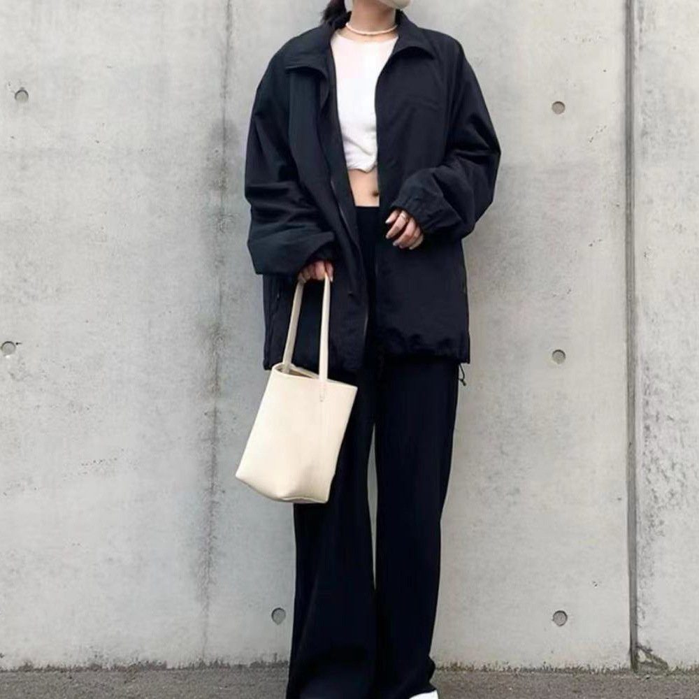 Japanese-Minimalist Leather Bucket Tote Bag in Black — side angle