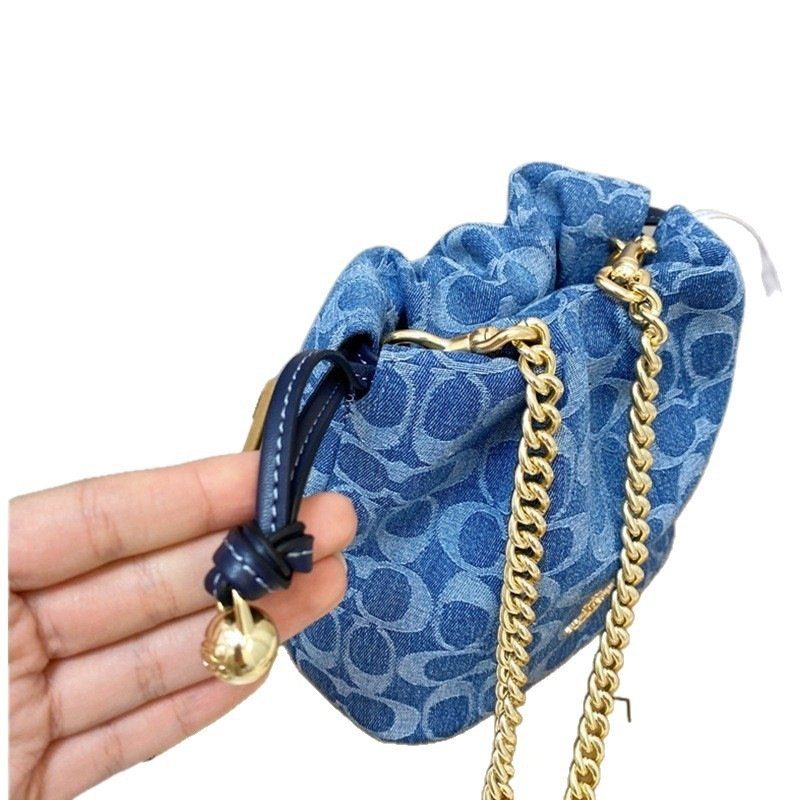 Leather Chain-Strap Bucket Crossbody Bag in Classic — detail close-up
