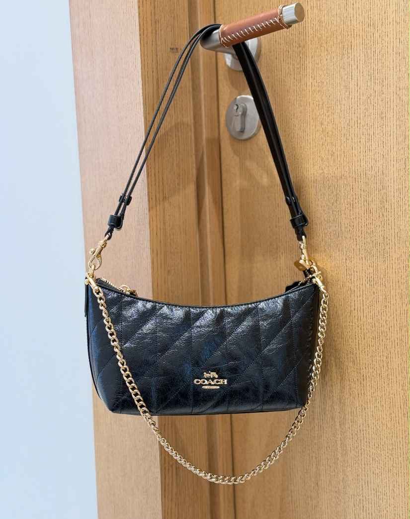 Leather Chain-Strap Underarm Crossbody Bag in Classic — worn on shoulder