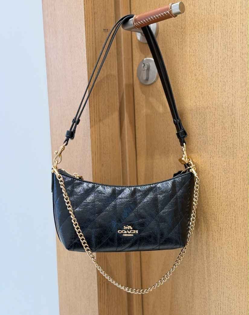 Leather Chain-Strap Underarm Crossbody Bag in Classic — worn on shoulder