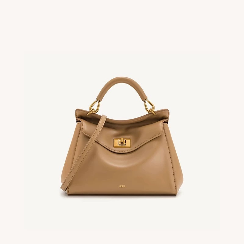 Lucia Lock Bag in Brown — styling photo