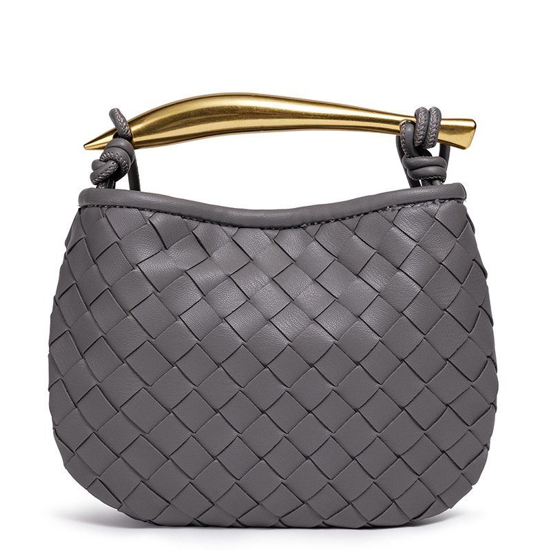Mini Sardine Woven Crossbody Clutch in Black — styling photo