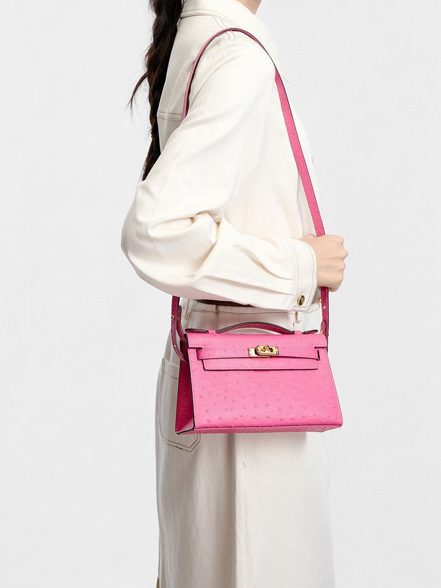 Ostrich-Embossed Top-Grain Leather Kelly Crossbody Bag in Pink — side angle