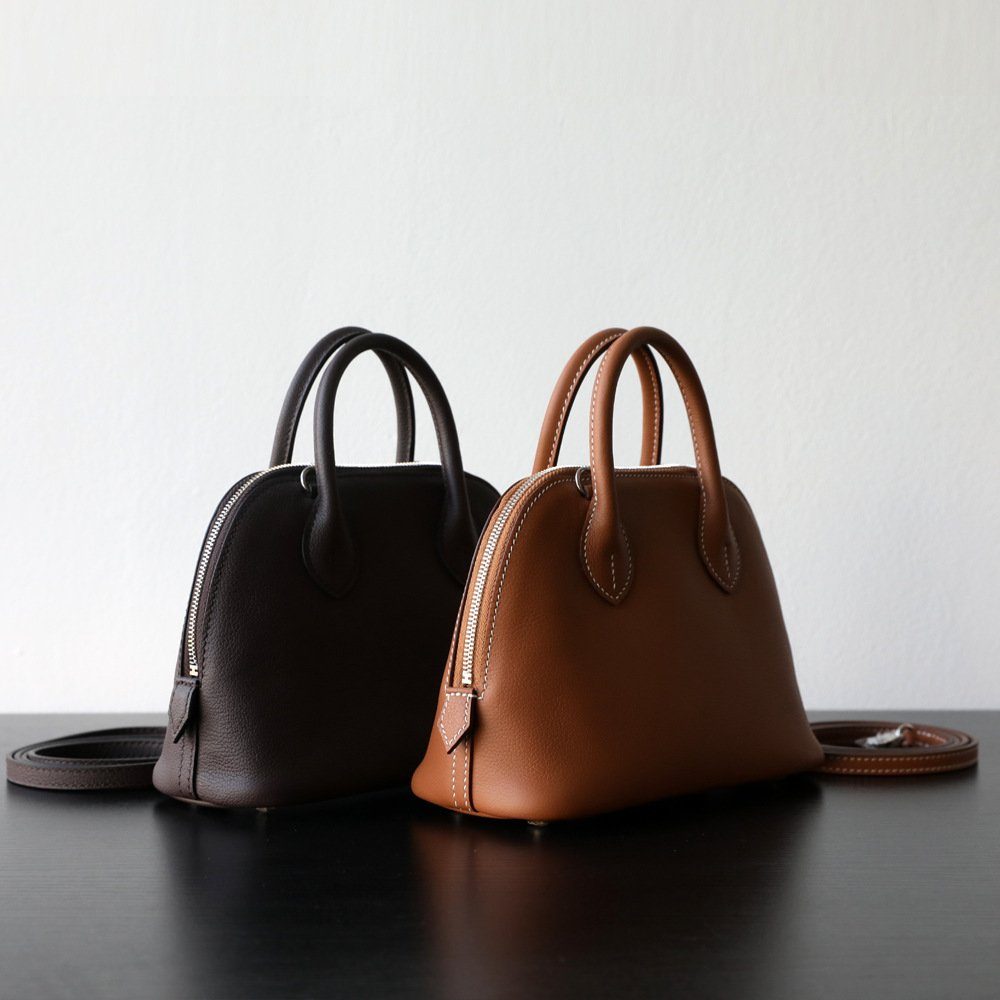Top-Grain Cowhide Bolide Crossbody Bag in Ivory — side angle