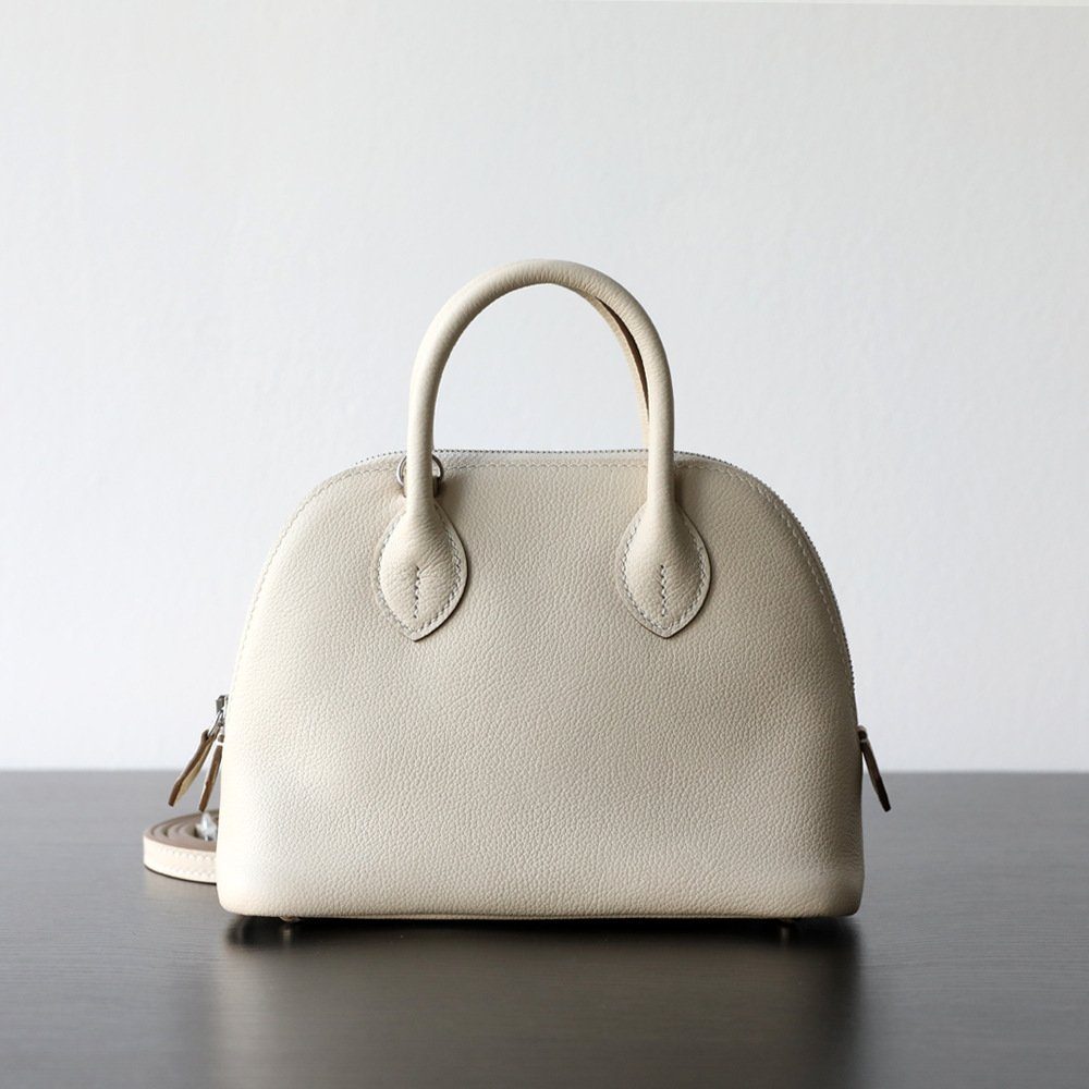 Top-Grain Cowhide Bolide Crossbody Bag in Ivory — styling photo