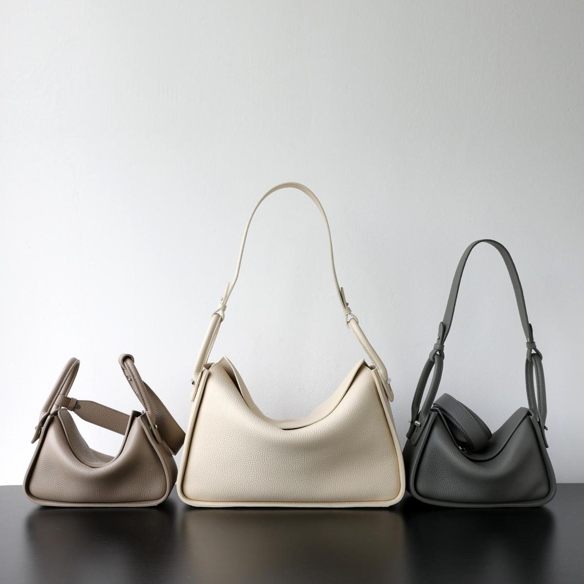 Top-Grain Cowhide Pillow Tote Bag in Beige — side angle