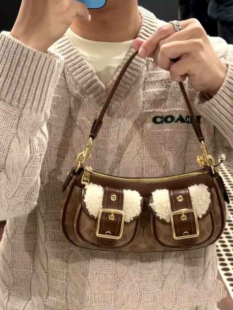 Underarm Baguette Crossbody Bag in Classic — worn on shoulder