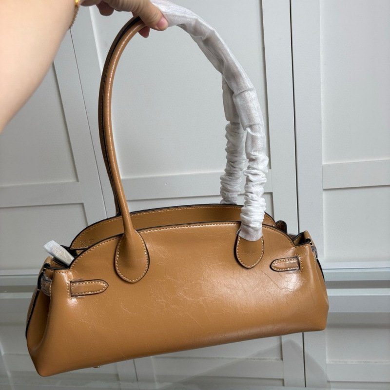 Underarm Baguette Tote Bag - Vintage Edition in Classic — worn on shoulder