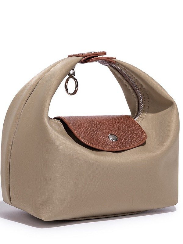 Waterproof Nylon Dumpling Shoulder Bag in Cream Yellow — back view