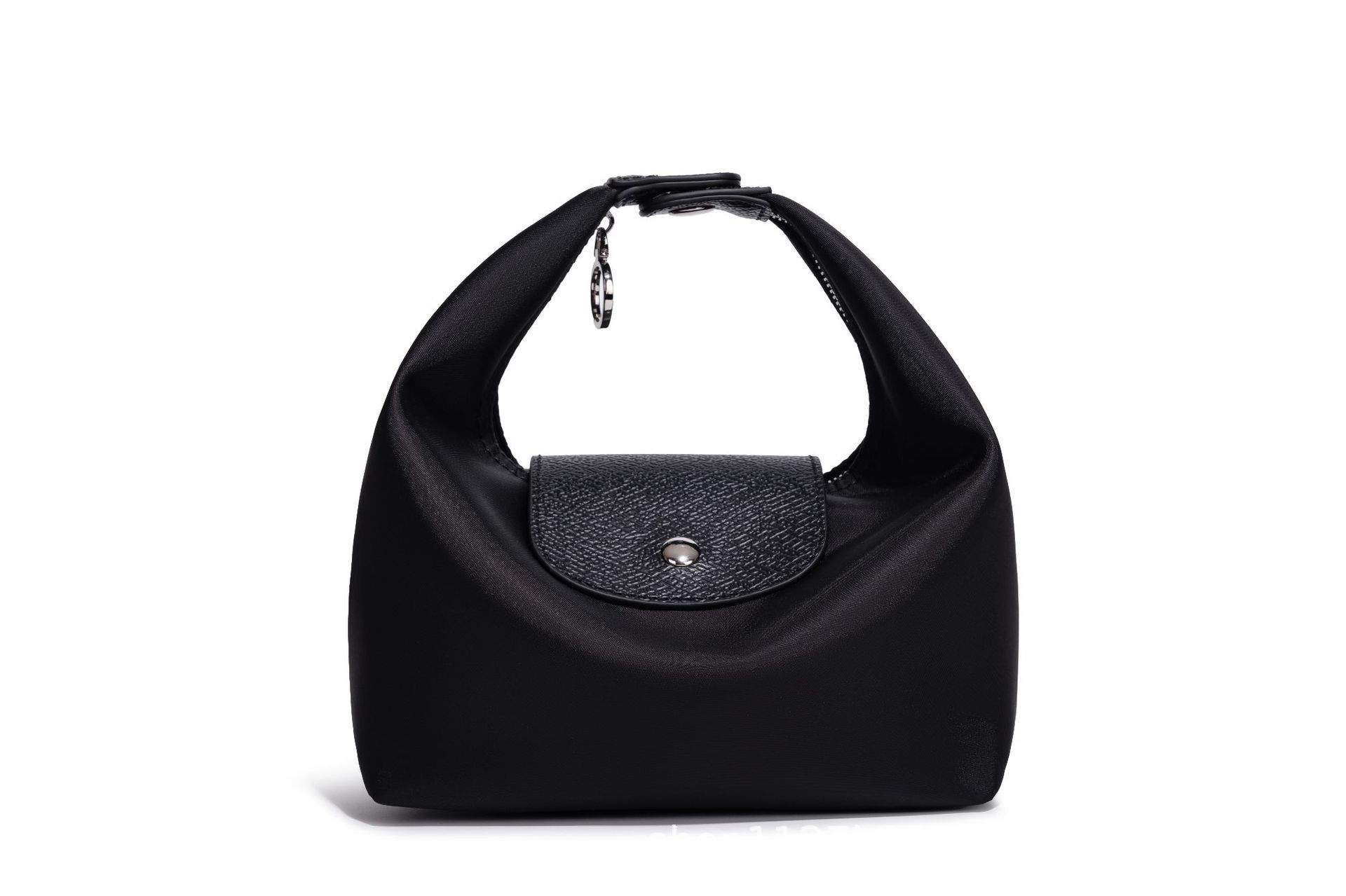 Waterproof Nylon Dumpling Shoulder Bag in Cream Yellow — styling photo
